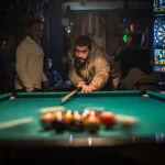 Man In Brown Jacket Playing Billiard